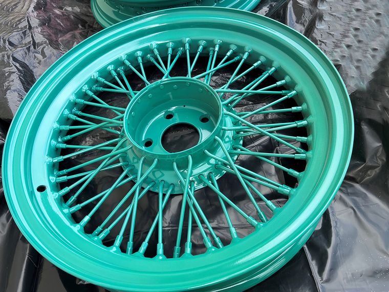 Teal Wire-Spoke Wheel