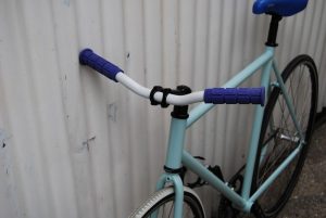 Pale blue push bike