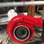 Red powder coated turbo close up