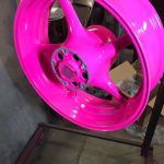 Neon pink powder coated wheel