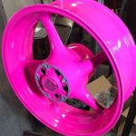 Neon powder coated wheel copped in